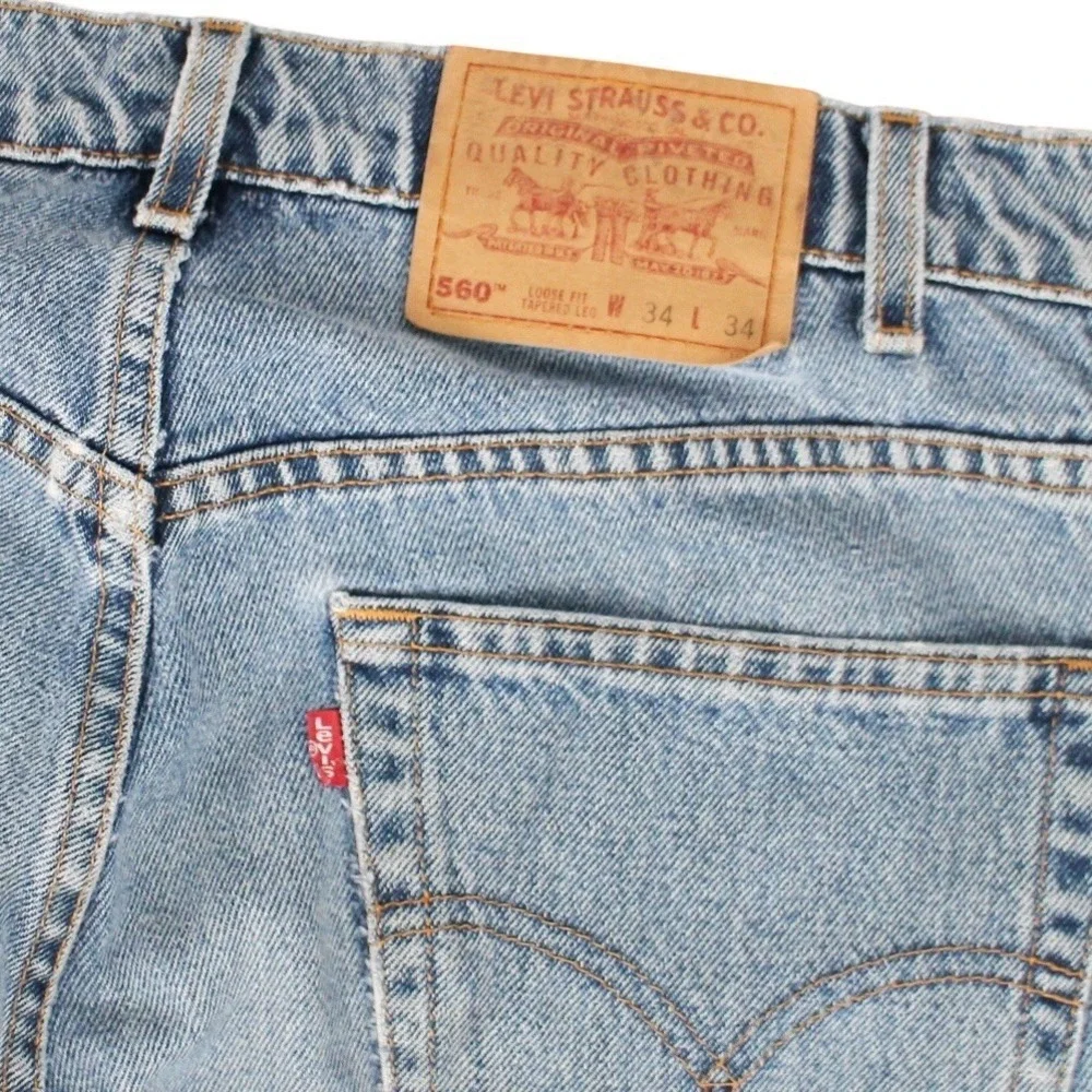 Vintage Levi's 560 Loose Fit Tapered Leg Jeans Light Wash Denim Mens 34x34